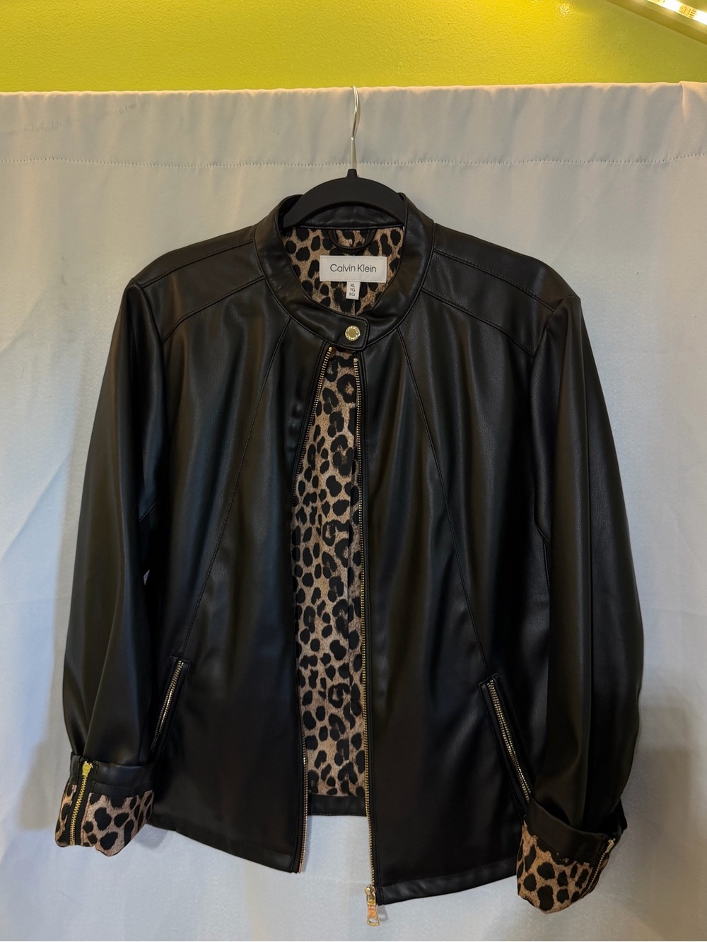 Calvin Klein Black Faux Leather Jacket with Leopard Lining